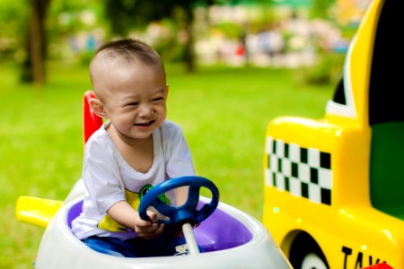 Baby Boy Driving Toy Car photo