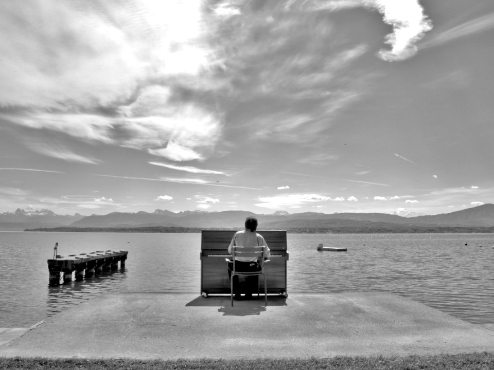 Playing Piano On Lake