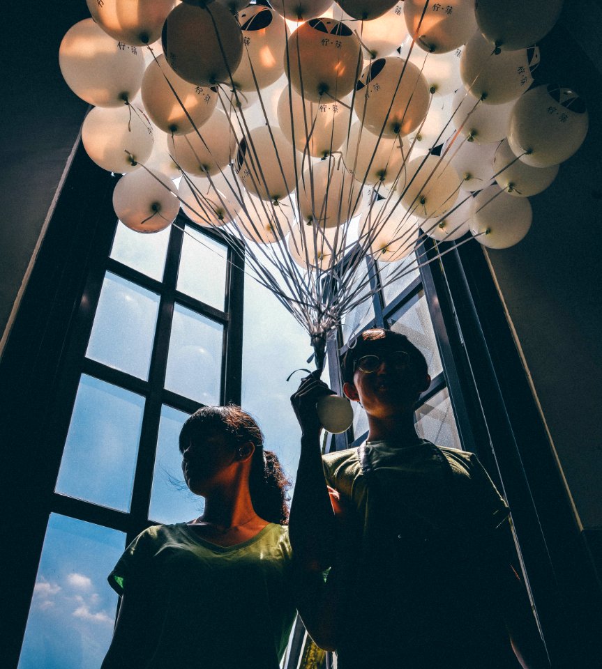 Sisters With Ballons