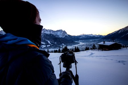 Photographer Photographing Snowy Landscape
