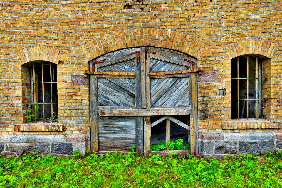 Wooden Door In Brick Wall photo