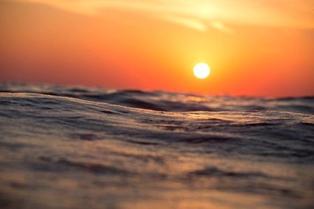 Sunset Over Ocean Waves photo