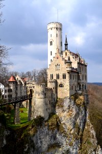 Gray And White Castle Built Near A Cliff