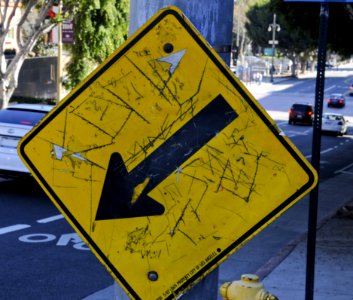 Grunge Yellow Arrow Sign photo