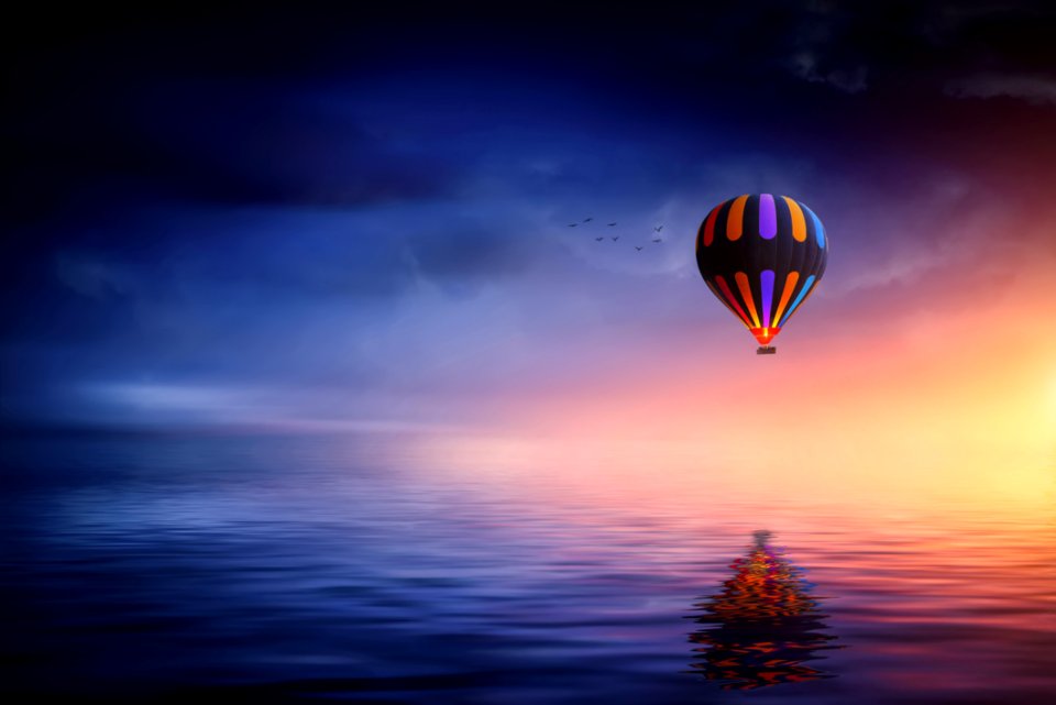 Hot Air Balloon Over Water