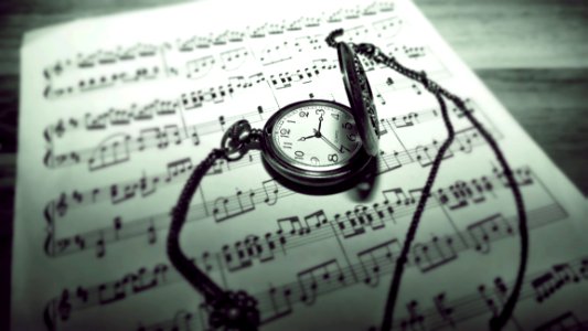 Pocket Watch On Sheet Music photo