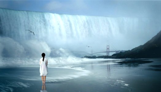 Woman In White Coat Standing Close To Waterfall