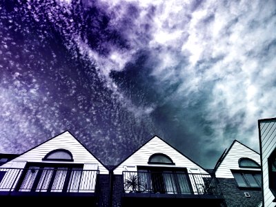 Housetops With Night Sky