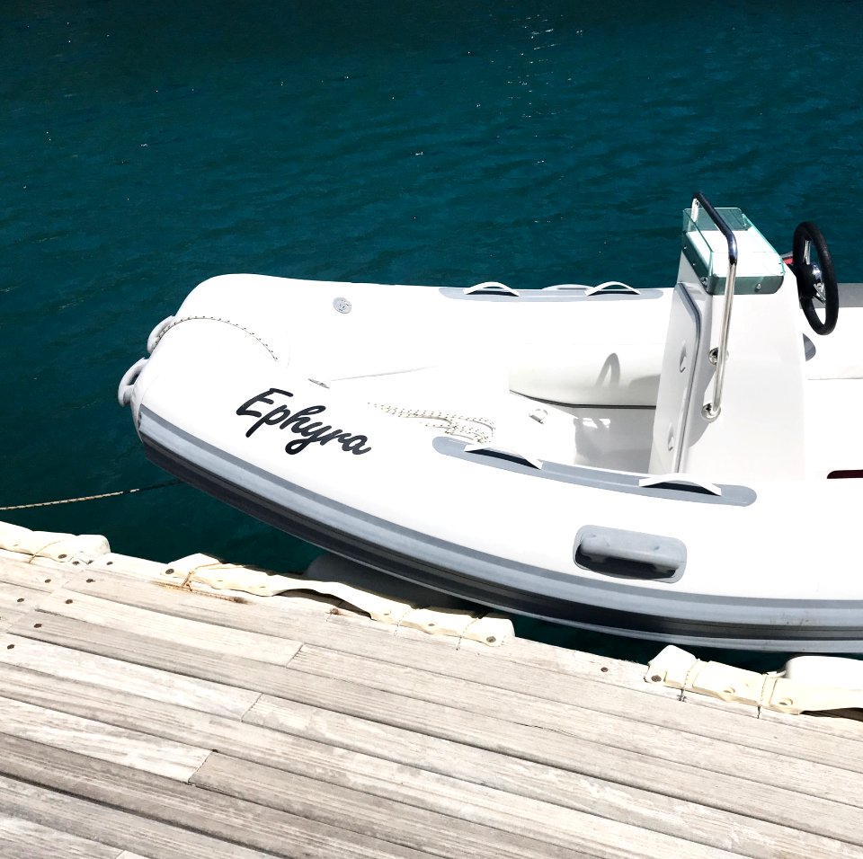 Watercraft Next To A Dock