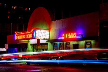 Movie Theatre Illuminated At Night photo