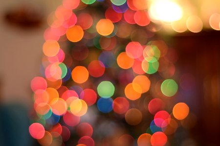 Defocused Image Of Illuminated Christmas Tree photo