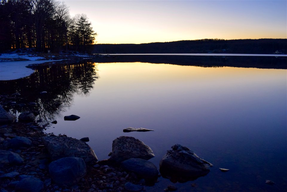 Sunset Reflecting In Calm Waters