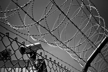 Razor Wire Fence And CCTV Camera photo