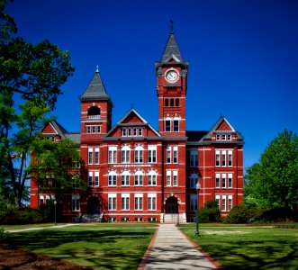 Red Building With Clock Tower photo