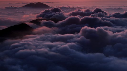 White Clouds Over The Mountain