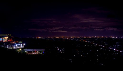 Aerial View Of City Illuminated At Night photo