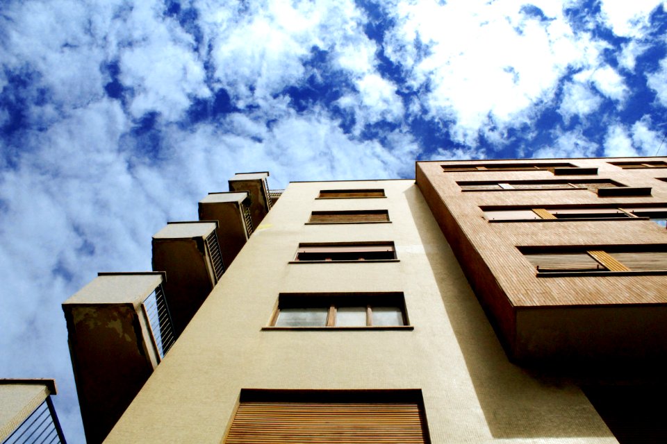 Apartment Building Against Blue Skies photo