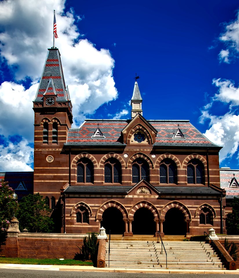 Brown Black And Grey Building Under Cumulus Clouds photo