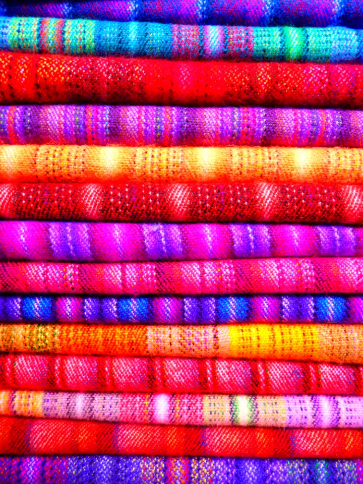 Pink And Blue Textile Near Yellow Textile