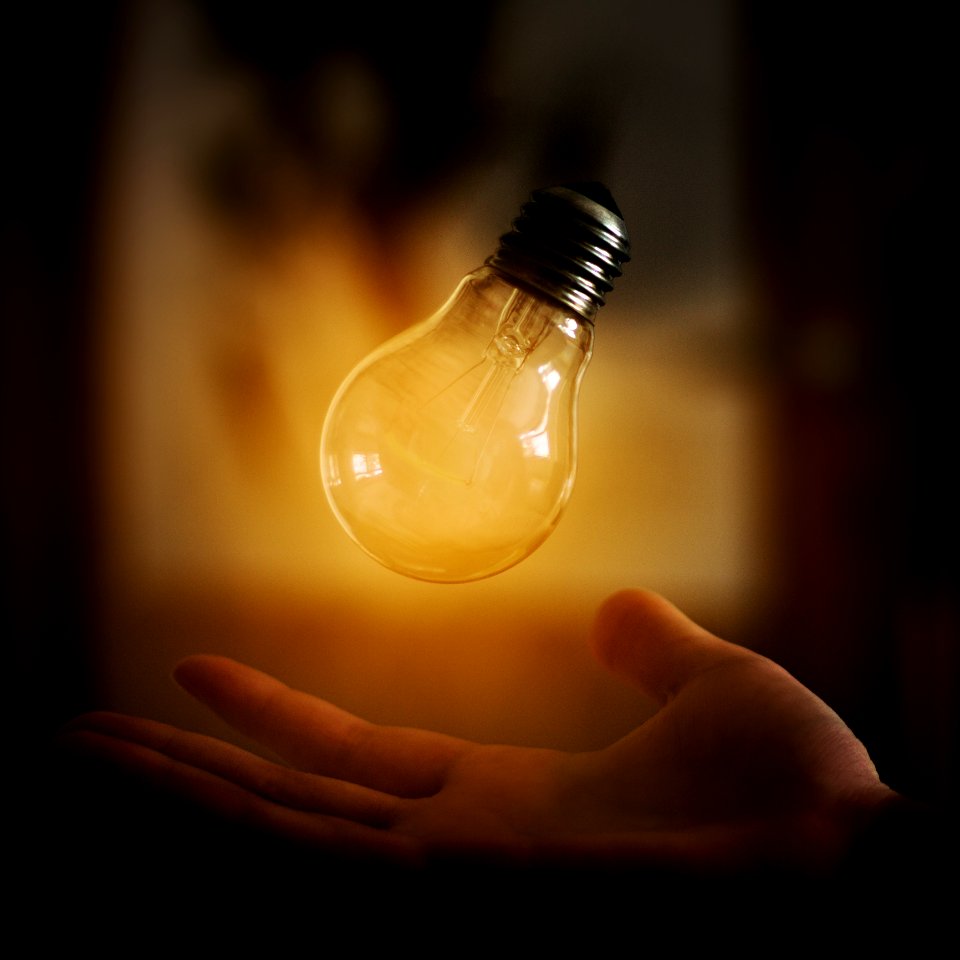 Light Bulb Above Hand
