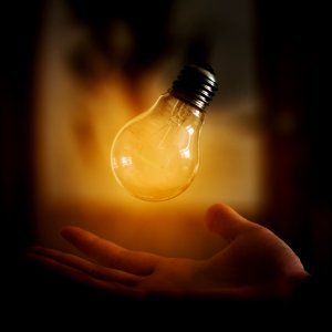 Light Bulb Above Hand