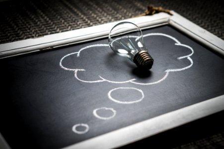 Lightbulb On Blackboard