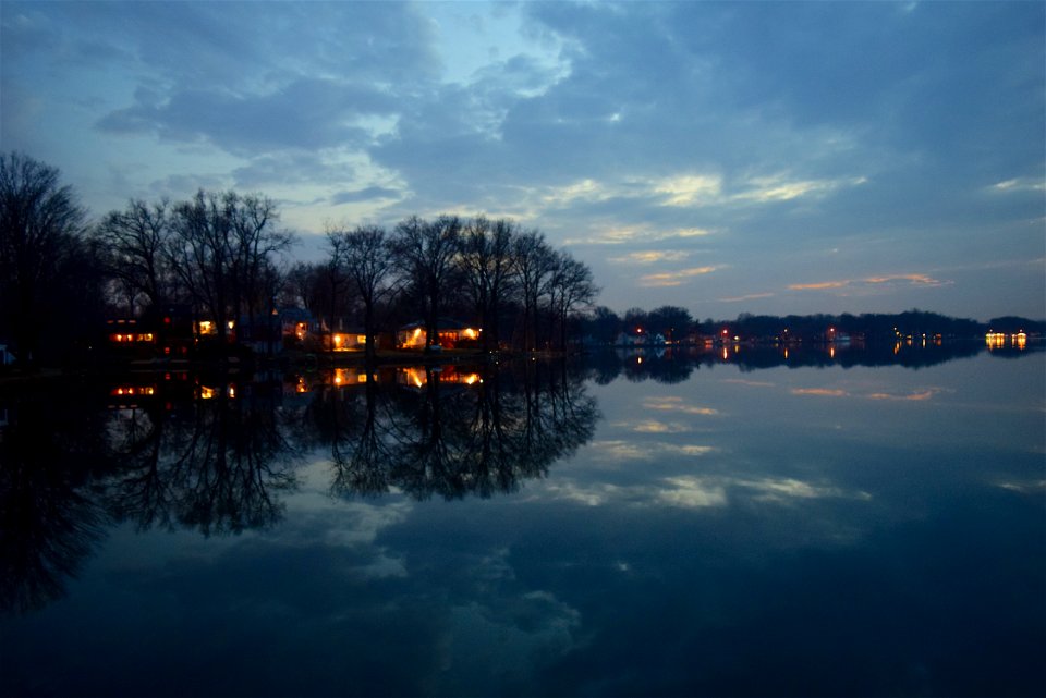 Houses By Shore Of Lake