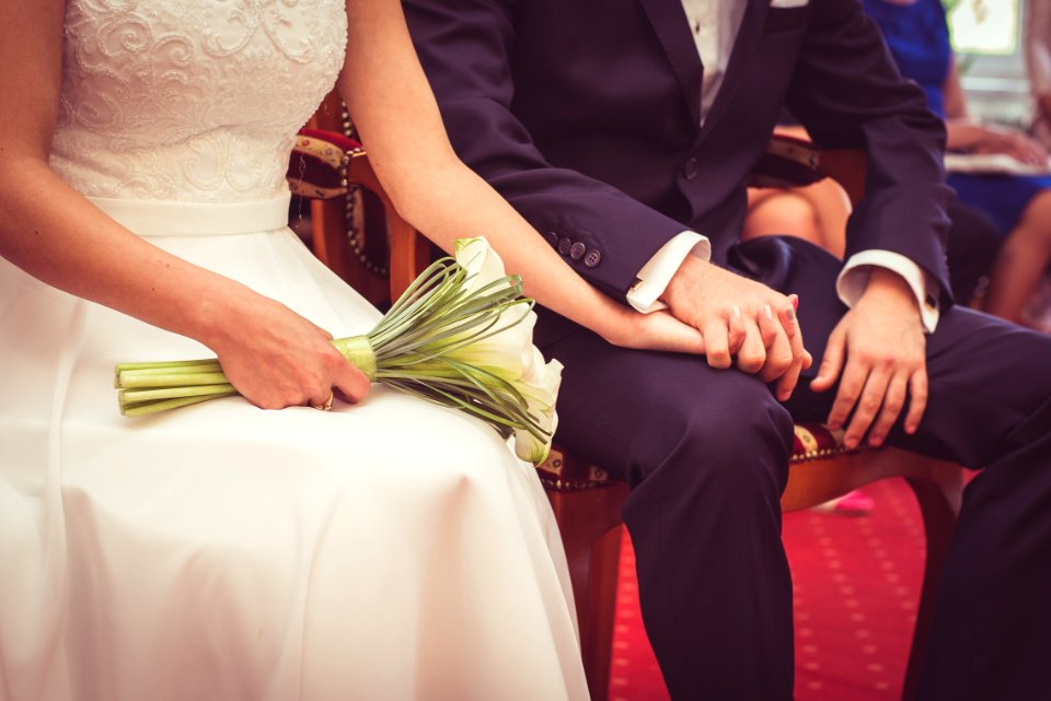 Married Couple Holding Hands