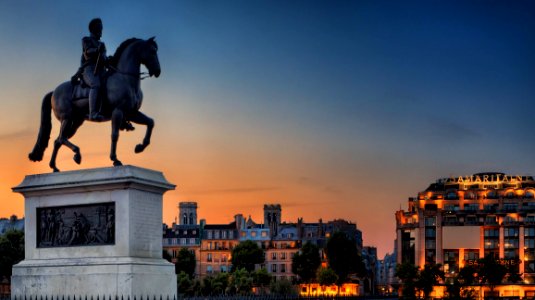 Man Riding Horse Sculpture