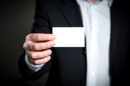 Close-up Of A Person Hand With Card photo