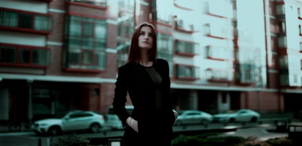 Woman Standing Looking Up
