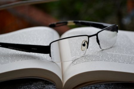 Eyeglasses On Book photo