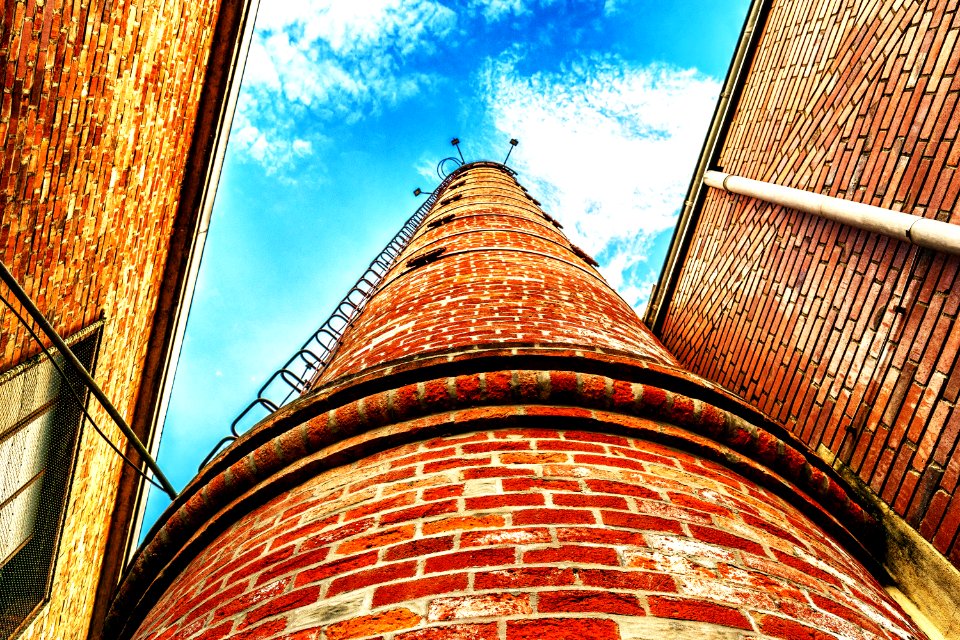 Low Angle View Of Brown Bricks Tower photo