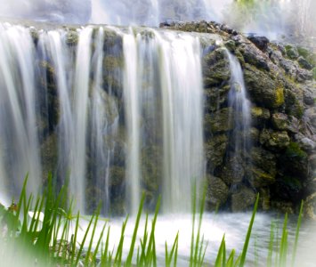 Waterfall Over Rocky Cliff