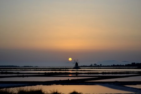 Silhouette Of Windmill During Sunset photo