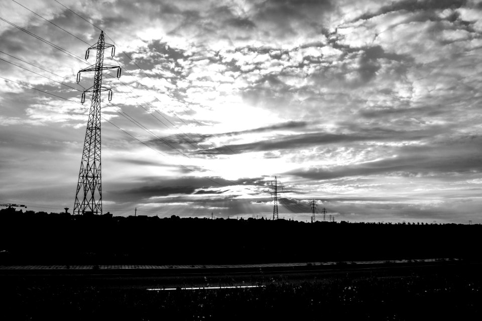 Electricity Pylons In Landscape