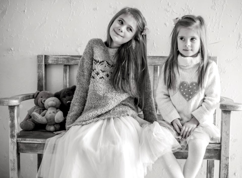 Portrait Of Happy Girls Sitting