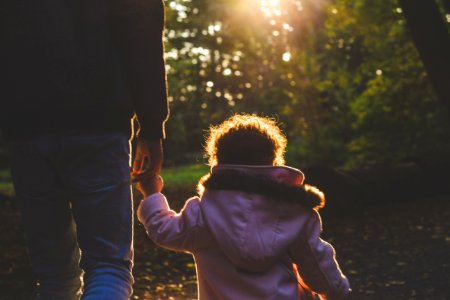 Toddler In White Hoodie During Daytime photo