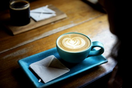 Cup Of Coffee In Stylish Rectangular Saucer