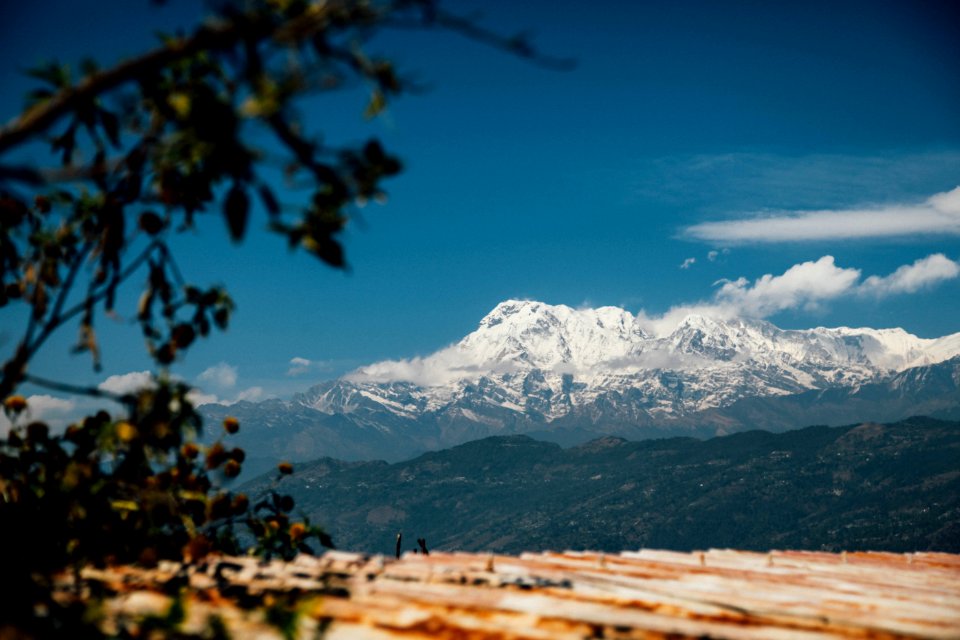 Snowy Peak In Distance