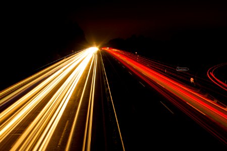Speeding Car On High Way During Night Time photo