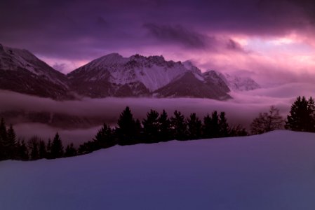 Scenic View Of Lake Against Dramatic Sky At Sunset photo