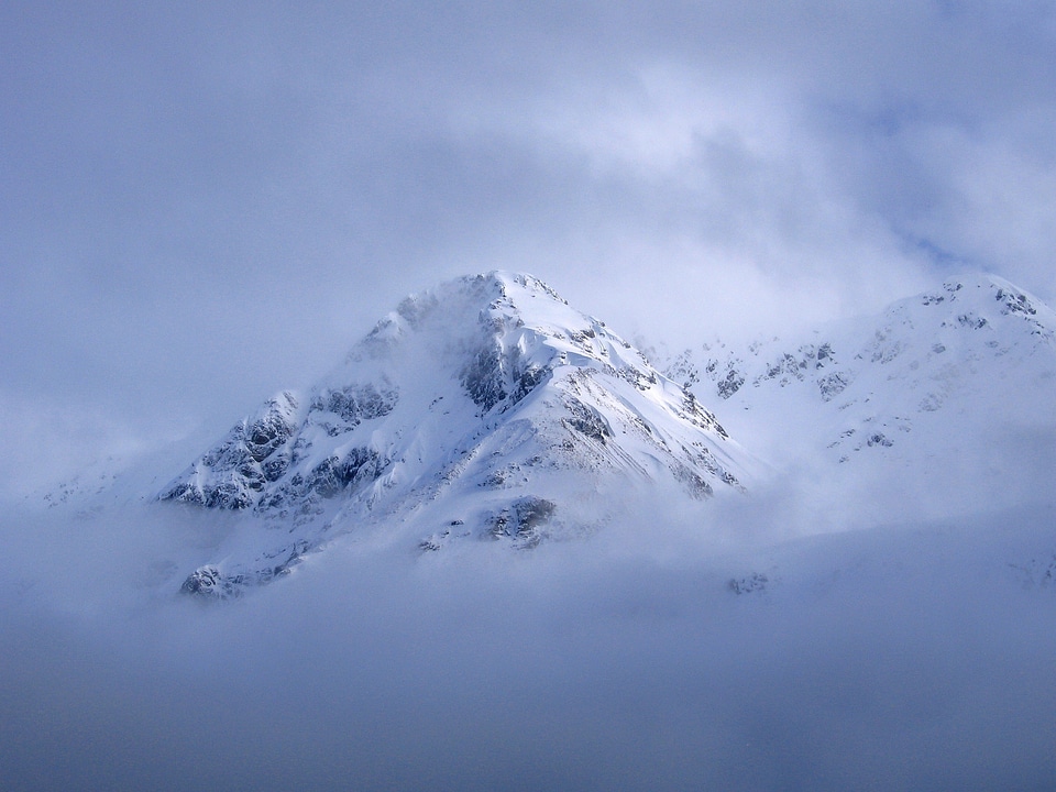 Clouds mountains peaks photo