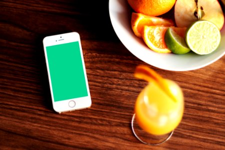 IPhone Apple Fruit Orange Lime Drink Wood Table Bowl photo