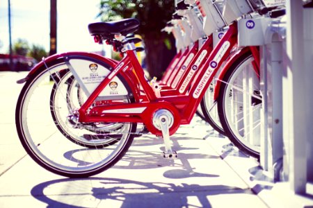 Red Bike Public Transportation Shadows Nashville Tennessee photo