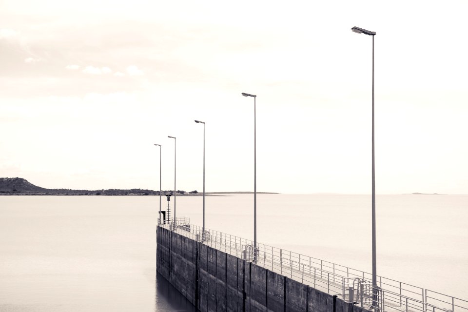 Unsplashcom  Water Ocean Pier Dock Light Pole Sky