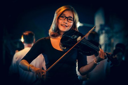 Portrait Of Woman Playing Violin photo