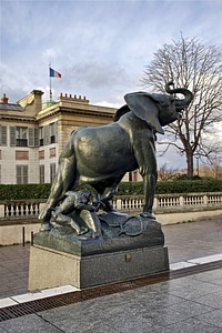 Monument elephant in trap buildings photo