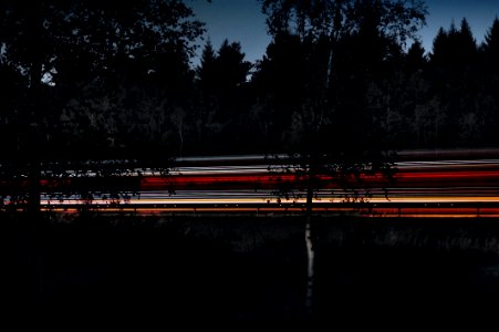 Light Streaks On Highway At Night photo