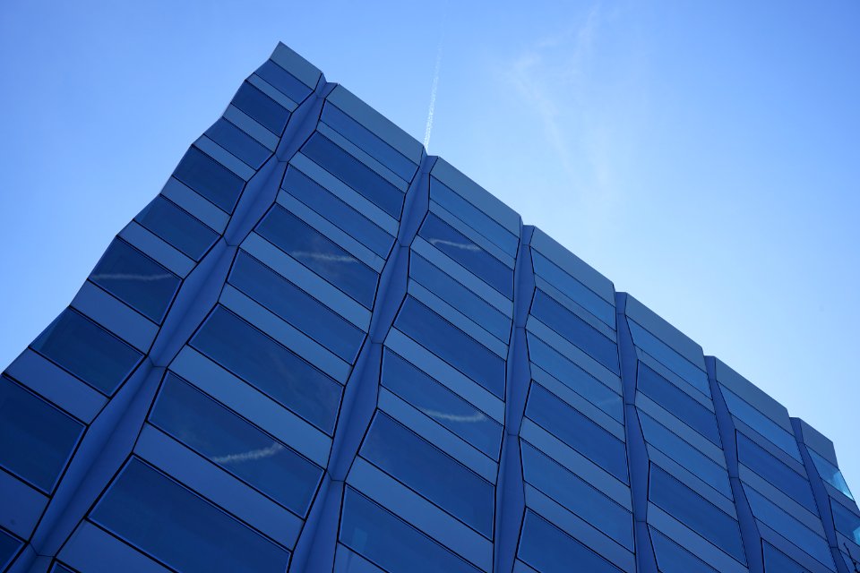 Corner Of Modern Building In Blue Skies